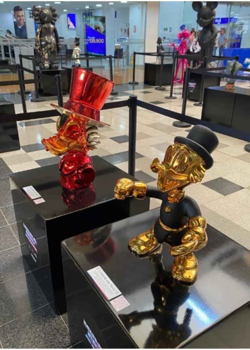 Escultura tio mac pato tio rico